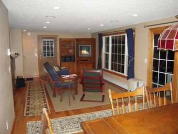 Combined living room, dining room, and open kitchen