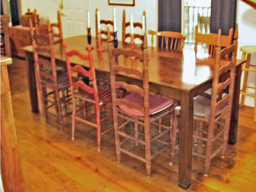 Dining Table and Chairs seats 8.  There are extentions to open to seat 16.