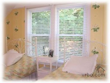  Charming Bedroom with set of double beds! Nice forested views.