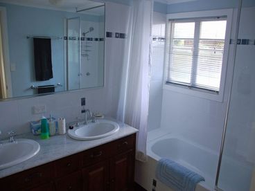 Family Bathroom
Bath with shower, 2 hand basins