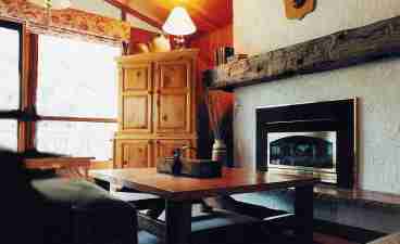 Enjoy the ambience of a fire at the flick of a switch: no muss,no fuss! The solid pine armoire conceals the satellive TV and VCR