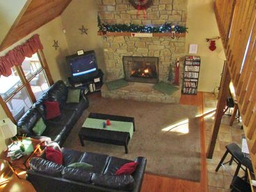 Great room with leather couches and gas fireplace
