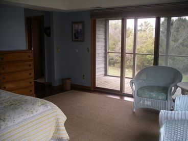 View of screen porch, bathroom to left and laundry room. 