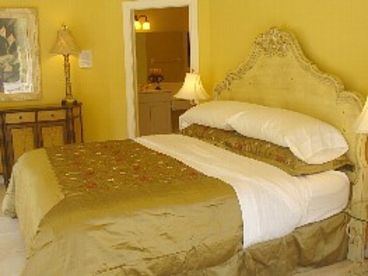 Master bedroom features silk comforter with Egyptian cotton sheets