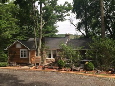 REAR VEIW OF PATIO AND SCREENED PORCH.
