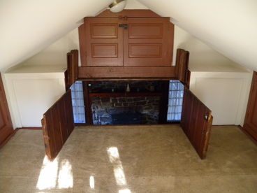 VIEW OF FIREPLACE FROM LOFT