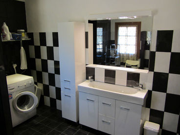 One of the three bathrooms