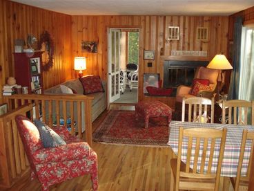 You will love the cozy interior of our cabin, with its wood-burning fireplace, its view of the lake, and tongue-in-groove pine throughout the entire cabin!