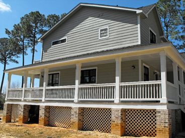 This lovely, brand new home offers views from the gallery on three sides.