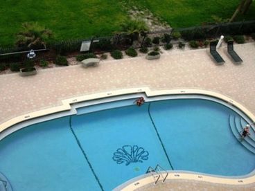 Sun bathing, outdoor shower, in-ground pool