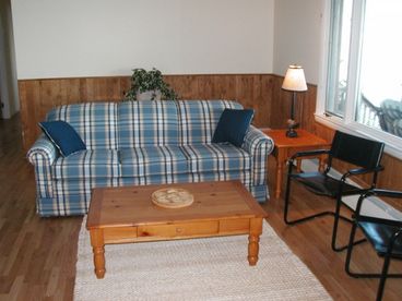 Comfy livingroom with panoramic view of the bay.