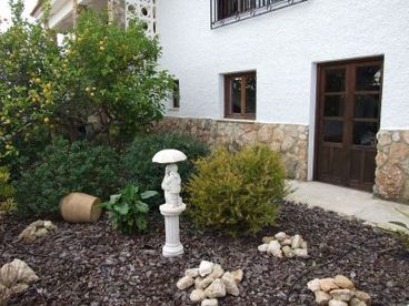 The french door of the master bedroom out into garden