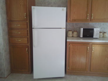 Pantry, refrigerator, and microwave area