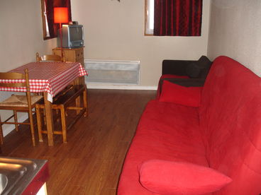 Cosy and warm living room & dinning area. Two sofa beds add extra sleeping space. 