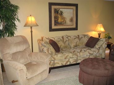 Living area with comfortable seating and 42 in. TV for your enjoyment.