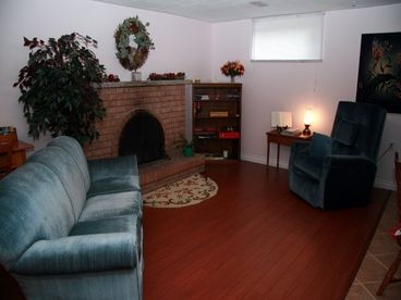Open concept sitting area by fireplace.  Seats 4 people.