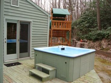 Just off the back deck is the large hot tub.  Not seen is the covered back deck sitting area or huge covered front deck.