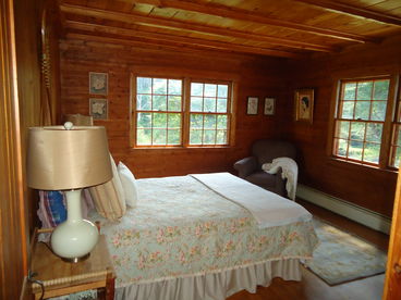 Beautiful and comfortable bedroom overlooking the pond and mountains.