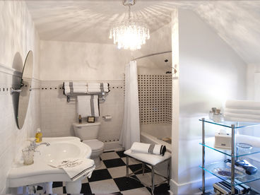 You will feel as though your in a French hotel in Paris when in this bathroom. The large soaker will allow you to unwind and relax after a busy day in the city. There is a lovely full length mirror, blow dryer and spacious enough for 2-3 people at a time. Lots of quality towels and complimentary French milled soaps for your stay.