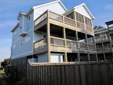 Back decks overlooking pool area with views of Pamilco Sound and Atlantic Ocean.  Enjoy the locally made Juniper or Seaside Casual furniture or the Hatteras hammock on the decks.