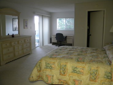 Master bedroom has walk-in closet, separate bathroom, reading alcove, and access to lanai