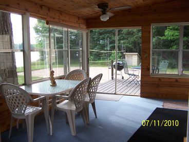 Sun-porch with outside deck.