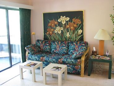 Living Room with 12 Bottle Wine Cooler and Sleeper Sofa