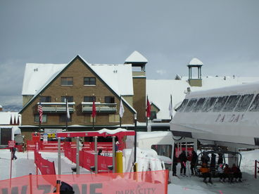 You want close to the slopes, this is your unit! The unit is one with the green balcony on the left over the lift! 