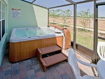 screened patio with private hot tub