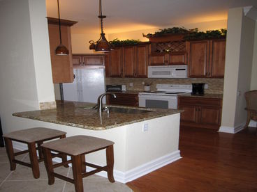 Kitchen - new granite, hardwood, 