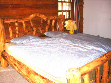 Bedroom with custom made aspen bed, new organic mattress