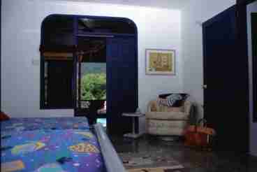 The bedrooms open onto the large veranda...Caribbean in front, pool in the back