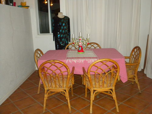 Easily room for six in this setting; the table can be turned, leaves added, and seat up to 10.