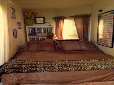 Queen bed. Enjoy the ocean view while still in bed.  