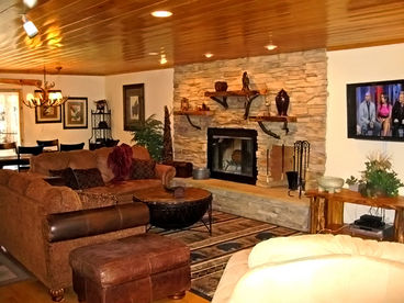 With flat screen TV and fireplace