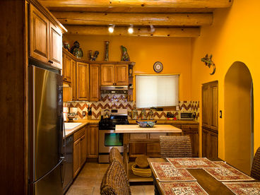 A kitchen full of flavor, culture, and stainless steel appliances.