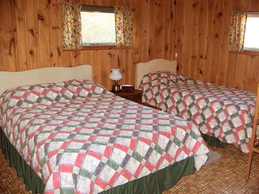Each bedroom has one double and one twin bed.