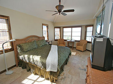 1 of 2 guest bedrooms that also have views of the water.