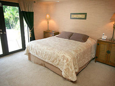King Bed with access to the lanai.   