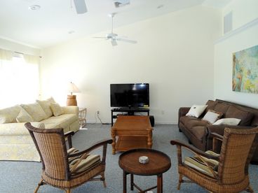 Spacious living room with vaulted ceilings