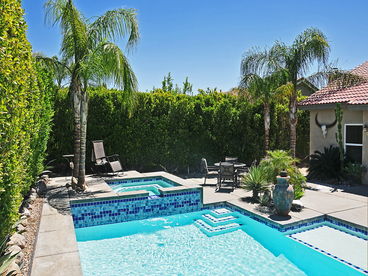 Your privacy assured with our 10ft. high ficus hedge surround backyard!
