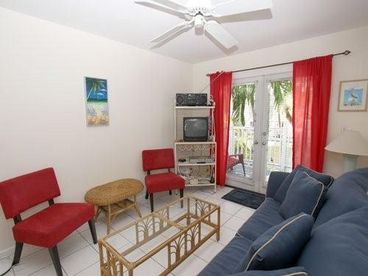 Living Room Opens Up To Private Back Deck