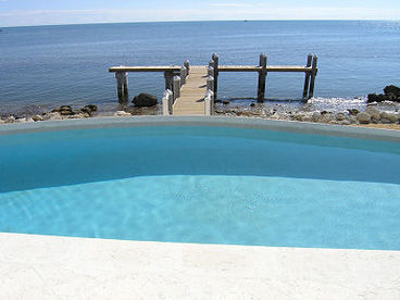 Poolside Fishing Pier With true Deep Water Dockage For Your Yacht!