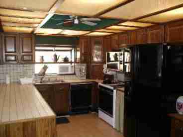 Fully equipped kitchen with all amenities.  Dishwasher, coffeemaker, Full size stove and refrigerator.  Microwave.