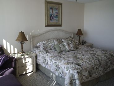 King bed, private bath and view of the beach