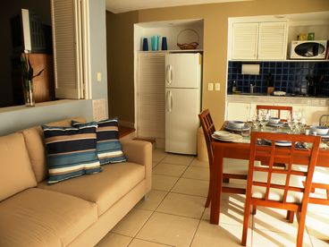 Fully equipped kitchenette and dining table and chairs for four guests