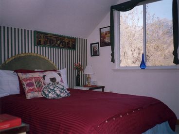 total two bed rooms with one queen bed each, duvet covered comforters, add. pillows and blankets