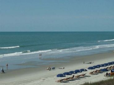 Look up and down the beach from this prime corner location.