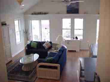 Family Room with cathedral ceiling - opens to full width front porch