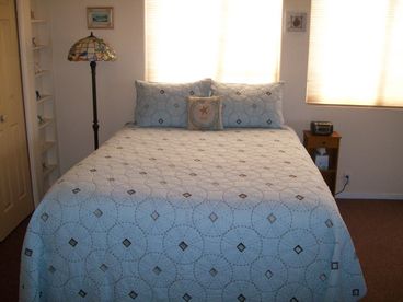 Downstairs queen bed with large closet area.